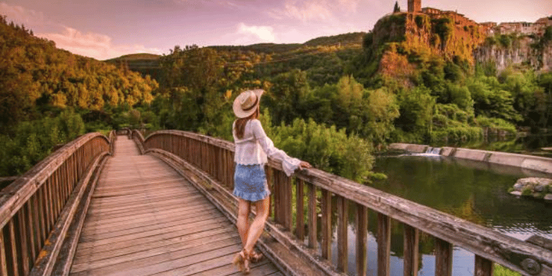 Women Standing On Bridge